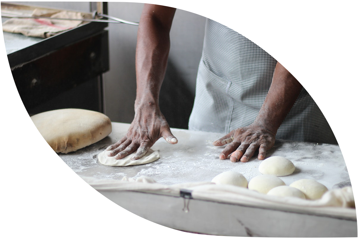 hands with bread